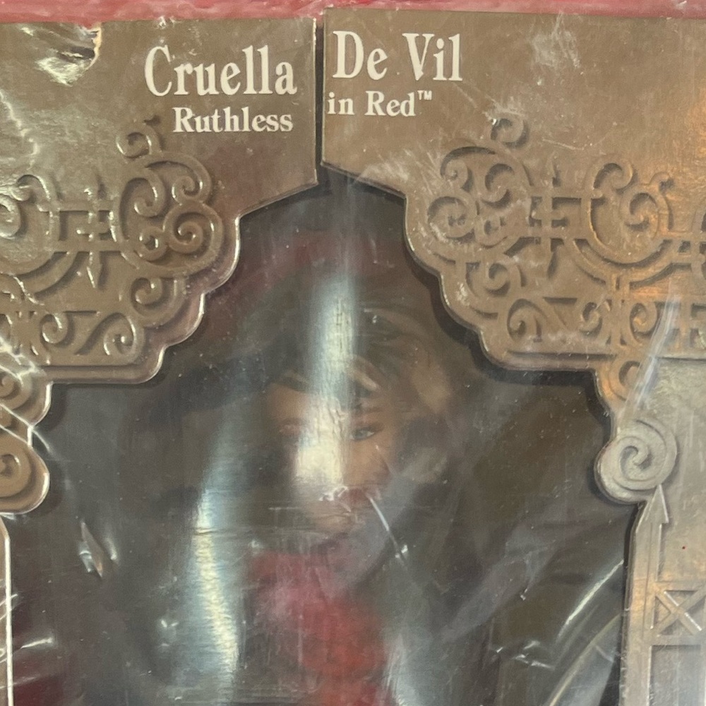 101 Dalmatian Cruella De Ville power in Red barbie